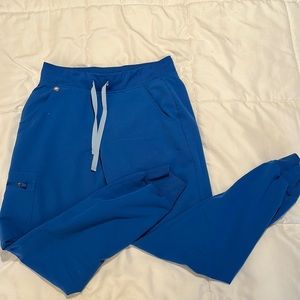 Gently worn FIGS Zamora jogger scrub pant in Royal Blue, size small